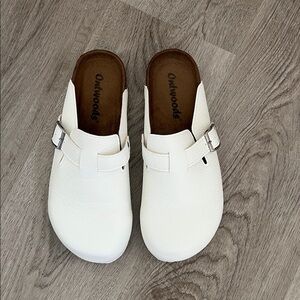 White Buckle Clogs